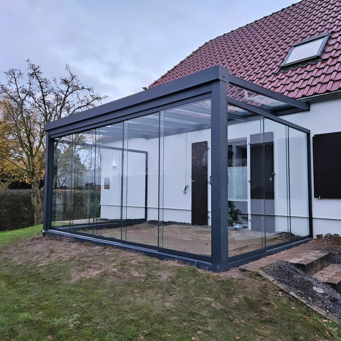 Glazen tuinkamer aan een vrijstaande woning